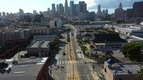 Aerial-view-in-front-of-a-tram-on-1st-street-in-sunny-downtown-Los-Angeles,-USA