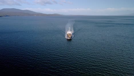 Shipping-Vessel-Cruising-Across-The-Tasman-Sea-in-Daytime-In-Tasmania,-Australia
