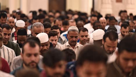 Faithful-performing-Taraweeh-prayer-during-Ramadan-2024-at-a-mosque-in-Sharjah,-United-Arab-Emirates