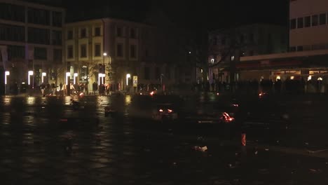 Fireworks-junk-burning-on-ground-of-city-square-after-New-Year's-Celebrations