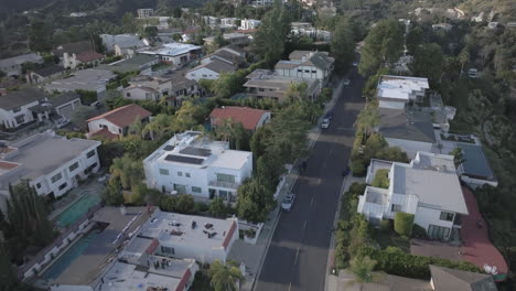 High-end-neighborhood-overlooks-a-canyon-in-Hollywood-Hills---aerial-flyover
