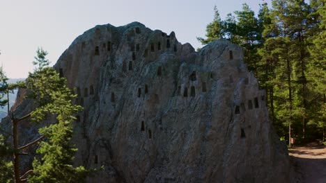 Panning-from-the-left-to-the-right-side-of-the-frame-of-a-historical-rock-formation-called-Eagle's-Rock-or-Orlovi-Skali-located-on-Rhodope-mountain-in-Bulgaria