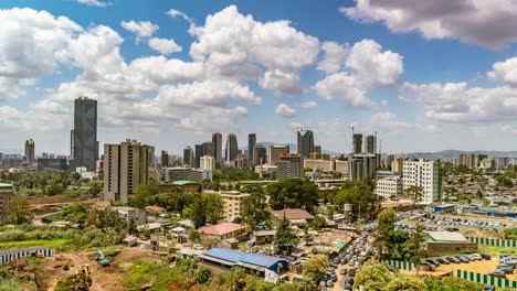 Addis-Ababa,-Ethiopia,-time-lapse,-fast-moving-clouds,-high-angle-view-of-the-city-center