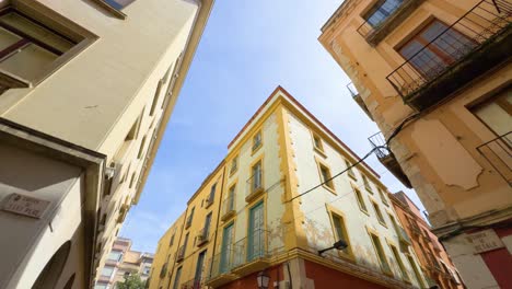 Facade-of-buildings-in-Figueras,-old-town-medieval-town-Costa-Brava