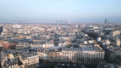 Paris-cityscape-with-La-Defense-skyscrapers-and-Montparnasse-tower-in-background,-France