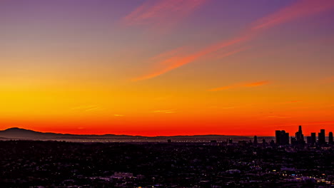 Timelapse,-Night-and-Sunrise-Above-Los-Angeles-Cityscape-Skyline,-Lights-and-Colorful-Sky