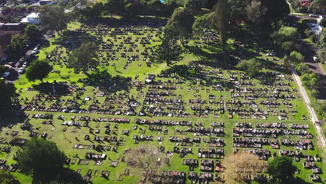 Aerial-drone-wide-shot-of-a-large-graveyard-in-Australia-on-a-sunny-day