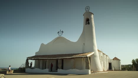 Landscape-view-of-the-peculiar-architecture-of-Stella-Maris-church,-symbol-of-Costa-Smeralda,-Italy