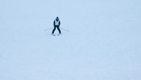 Skier-skiing-on-a-track-or-run---tracking-slow-motion-shot