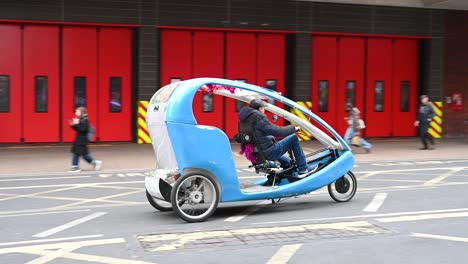 Get-on-the-Pedal-Powered-Rickshaw,-London,-United-Kingdom