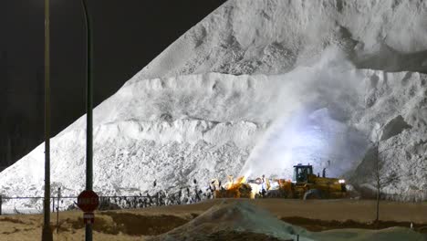 Tractor-removing-snow-from-highway-in-Montreal,-Canada