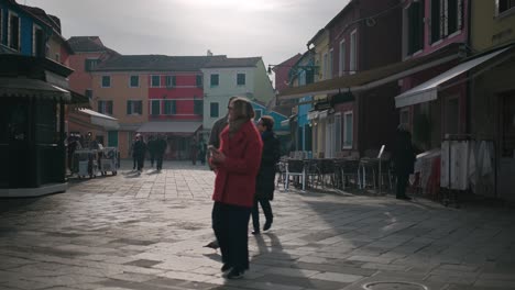 People-Stroll-through-colorful-Burano-alley