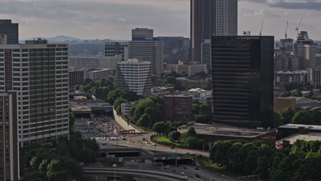 Atlanta-Georgia-Aerial-v924-drone-flyover-complex-interstate-freeways-capturing-busy-traffics-and-urban-cityscape-across-downtown,-O4W,-Midtown-and-Buckhead---Shot-with-Mavic-3-Pro-Cine---May-2023