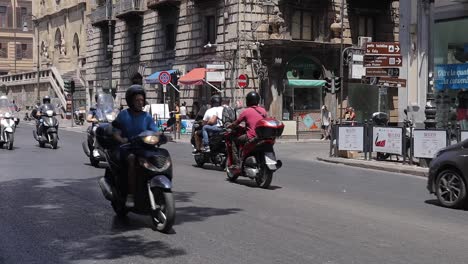 Motorist-passing-in-the-street-of-Palermo-Italy