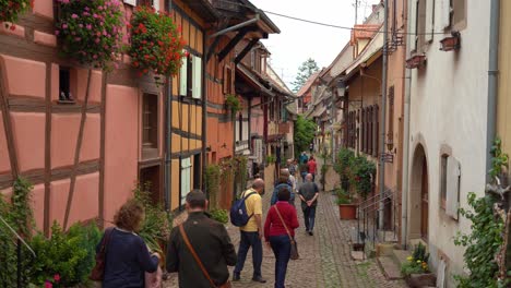 Eguisheim-medieval-village-pleases-for-its-modest-size,-its-unique-architecture,-its-profusion-of-flowers-in-the-summer-or-even-autumn