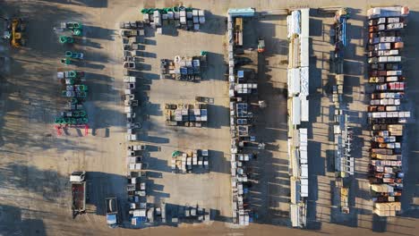 Overhead-drone-aerial-footage-of-industrial,-commercial,-yard