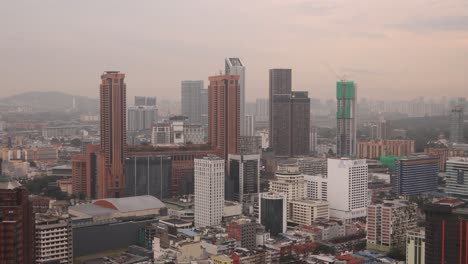 evening-dusk-shot-of-urban-cityscape-skyline-in-Kuala-Lumpur,-Malaysia