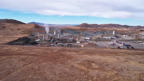 Drone-Shot-of-Concrete-Plant,-Cement-Hills-and-Transit-Mixer-Trucks,-Prescott-Valley,-Arizona-USA