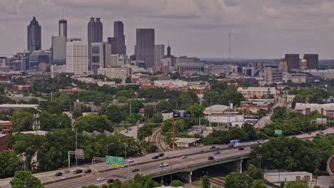 Atlanta-Georgia-Aerial-v930-zoomed-flyover-capturing-Castleberry-Hill-residential-neighborhood-and-cityscape-of-downtown-and-Midtown-featuring-landmark-stadium---Shot-with-Mavic-3-Pro-Cine---May-2023