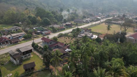 Stunning-sunrise-over-small-town-in-Asia-in-a-beautiful-green-landscap