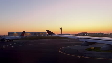 Air-Canada-aircraft-landing-at-Toronto-Pearson-airport-at-sunset