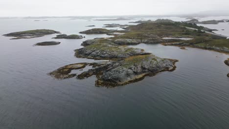 many-rocky-islands-in-the-north-sea,-archipelago-landscape,-norway,-nature,-drone