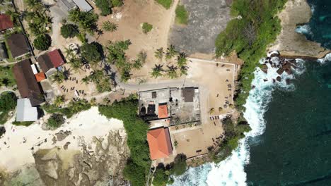 Aerial-Drone-Shot-of-5-Star-Luxury-Resort-on-the-Edge-of-the-Cliff-by-the-Ocean-in-Bali,-Indonesia