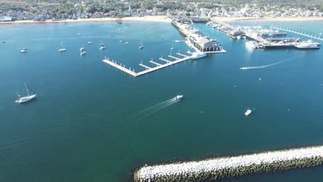 Aerial-view-of-boats-at-sunny-Provincetown-Harbor-in-Massachusetts