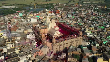 Aerial-drone-view-down-to-top-angle-shot-Lots-of-people-playing-dhule-and-lots-of-people-paint-and-water-from-above-and-people-playing-below