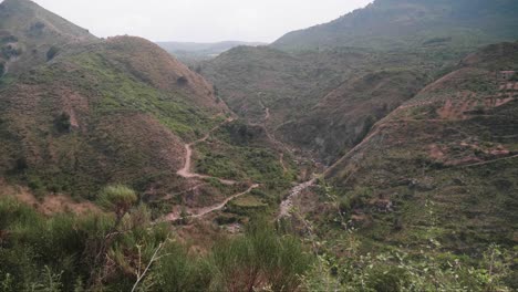 landscape-view-of-the-hill-full-of-greenery-in-Sicily-with-real-trees-and-a-path-in-the-middle-of-the-mountains