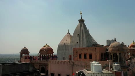 aerial-drone-view-best-Mathura-shot-where-drone-camera-is-moving-from-bottom-to-top-where-many-people-are-playing-with-dusty-colors