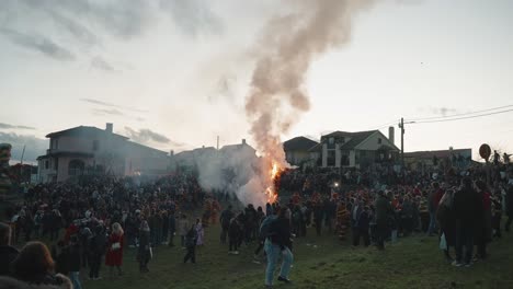 Bonfire-at-Dusk-During-Podence-Carnival,-Portugal