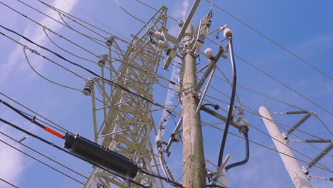 Low-angle-view-looking-up-at--power-lines