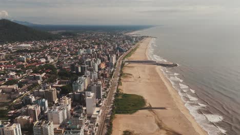 A-panoramic-view-of-Matinhos,-located-on-the-coast-of-Paraná,-Brazil,-showcasing-its-recently-widened-beachfront,-offering-an-expansive-and-inviting-shoreline