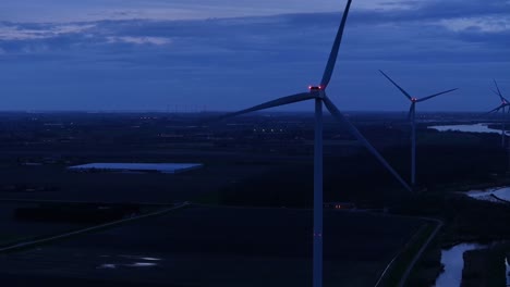 Wind-Turbines-In-Oude-Maas-During-Dusk-In-The-Netherlands---Drone-Shot