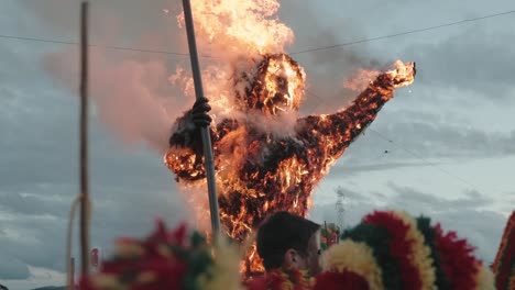 Crowd-looking-Fiery-effigy-at-Podence-Carnival---slow-motion