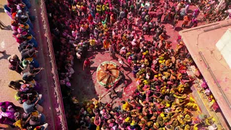 aerial-drone-view-don-camera-going-downtown-where-a-ghumar-is-dancing-but-all-the-people-are-playing-dhuleti