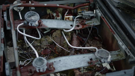 Handheld-close-up-rusty-old-engine