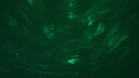 Green-abstract-background.-Twisted-smoke,-random-fluid-shapes
