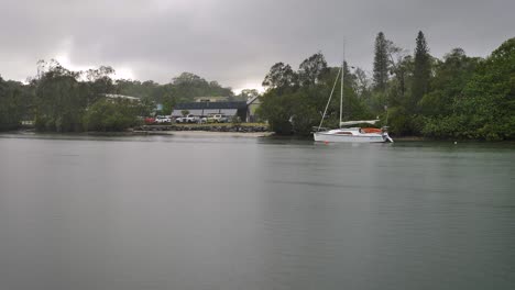 Boat-moored-along-the-Tweed-River-close-to-shore,-Northern-New-South-Wales,-Australia