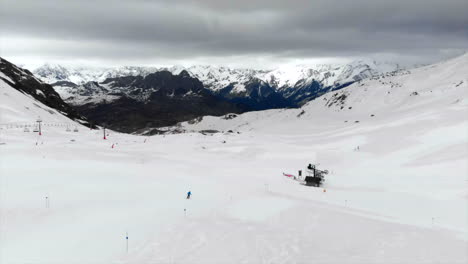 Drone-view-of-skiing-down-a-slope