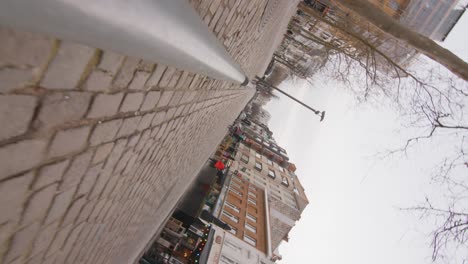 slowmotion-low-to-curb-rotating-3D-tunnelshot-of-Antwerp-city-with-bypassers