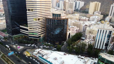 Aerial-pullback-above-luxury-black-and-gold-hotel-in-Mekkah-Saudi-Arabia