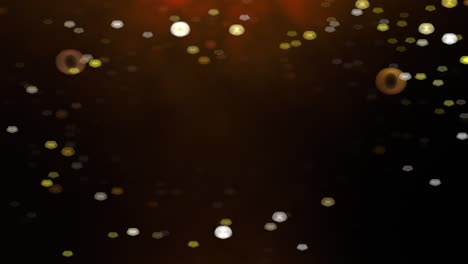 Gold,-glittering-particles-floating-down-on-a-dark-background,-HQ-looping-animation