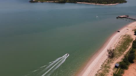 Overhead-aerial-moving-clip-of-remote-community-coastline-in-northern-Australia