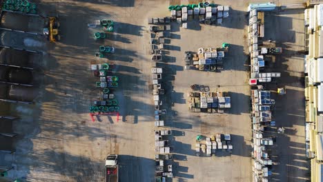 Overhead-drone-aerial-footage-of-industrial,-commercial,-yard