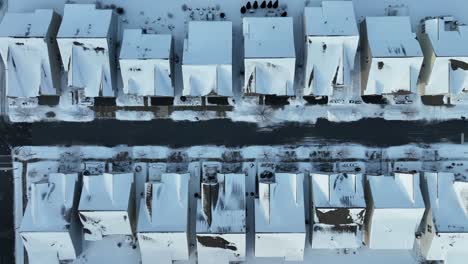 Birds-eye-view-of-house-roofs-with-snow