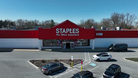 Aerial-approaching-shot-of-Staples-Office-Superstore-in-American-Town