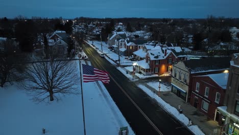 American-flag-in-small-historic-town-during-dusk