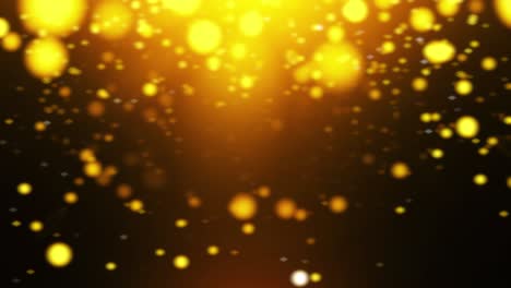 Gold-and-yellow-particles-fade-in-and-out,-dancing-around-on-a-dark-background